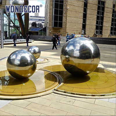 Large stainless steel spherical abstract sculpture