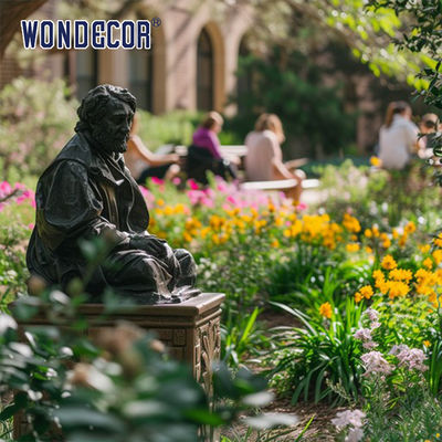 Bronze figure sculpture in the central square of the city garden